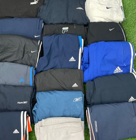 Pantaloni paracadute in nylon di marca