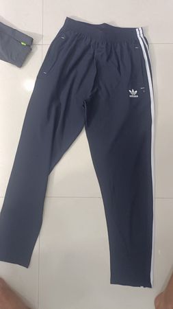 Nike and Adidas track pants