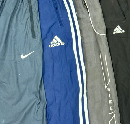 Pantaloni in nylon Nike e Adiddas