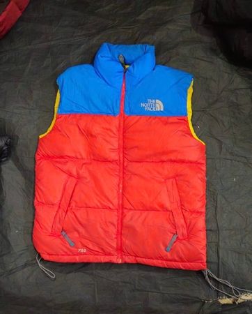 The North Face Puffer vests