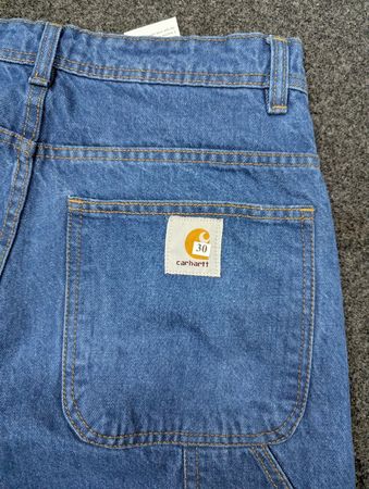Pantalon de travail vintage Carhartt bleu à genouillère unique