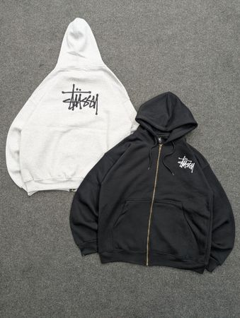 Stussy Sweatshirts à capuche zippées en noir et gris avec broderie style retravaillé