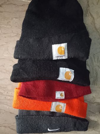 Carhartt polo and Nike beanies