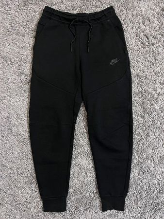 Nike track trousers.
