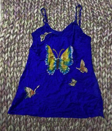 blue butterfly-patterned camisole top
