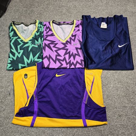 AV-1352 Nike Tank Tops