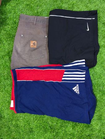 Shorts mix con marchio