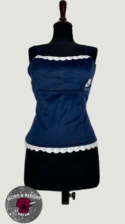 Top di marca riciclati
