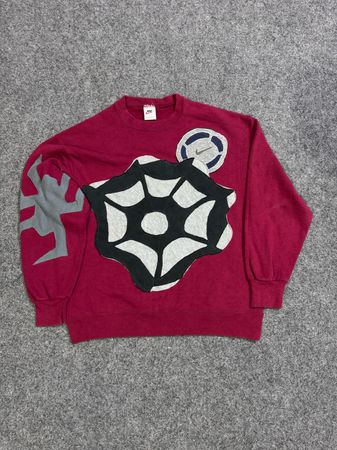 Pull en patchwork Nike upcyclé