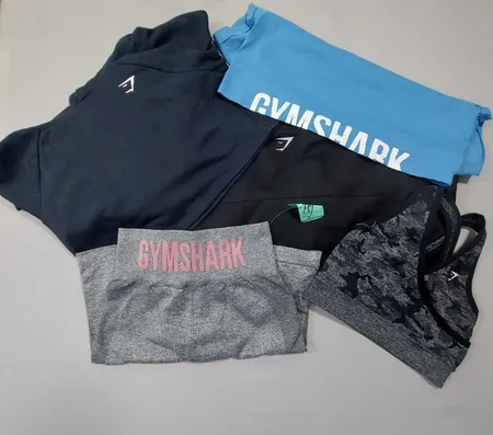 Gymshark Mix Bundle – Leggings , Jacket, CNN Hoodie , Trousers, Shorts, Crop Tops, Tops & Sports Bra – Grade A/B – 20 Pcs | 09-046 CNN Co