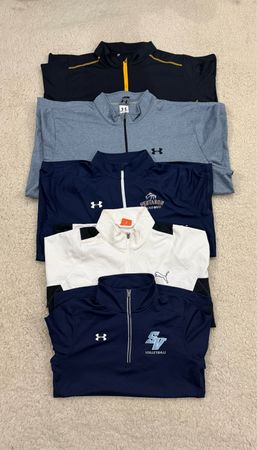 Maglie Under Armour & Puma